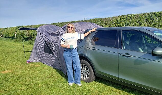 When your car keys and your bed for the night are the same thing: Jo pictured testing out Aldi's £69.99 car tent