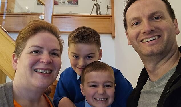 Nicola Shaw with husband Darren and their two sons... she says seeing the look on the boys' faces when she said couldn't play with them was heartbreaking