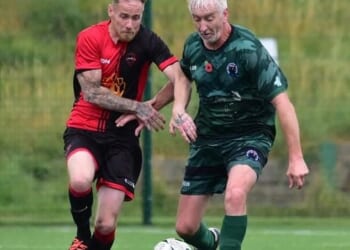 Mr Kirby plays football against people half his age and his video clips have gone viral online
