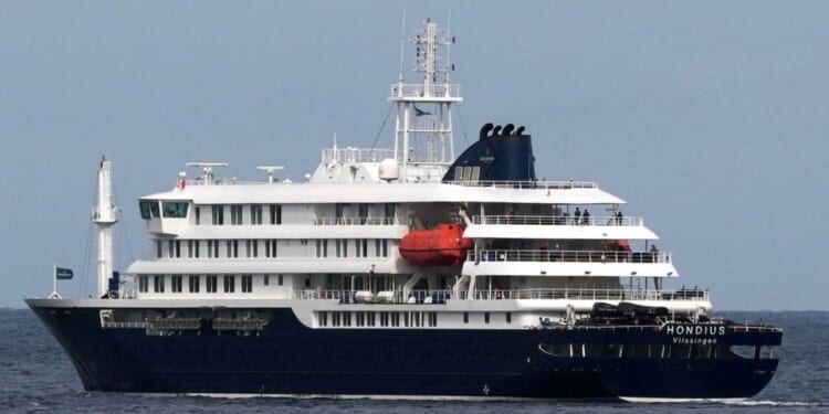 The MV Hondius cruise ship departs the port in Praia, Cape Verde, Wednesday.