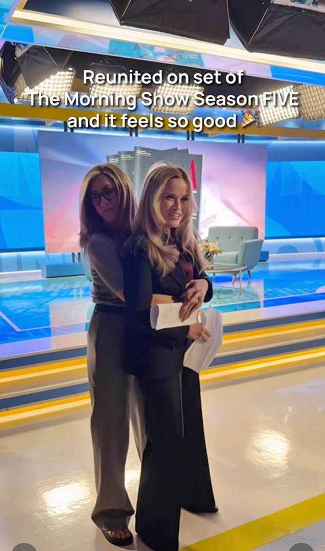 Aniston pictured on set with co-star Reese Witherspoon