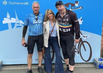 Kate Garraway cosied up to her broadcaster friend Liam Halligan (R) on Friday after 'growing close' as he prepared to take on a huge 300km charity bike ride