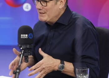 Sir Keir Starmer has warned there will be an ' inflation spike' caused by a 'war on two fronts' but says the country must not simply return to the 'status quo' after the war in Iran