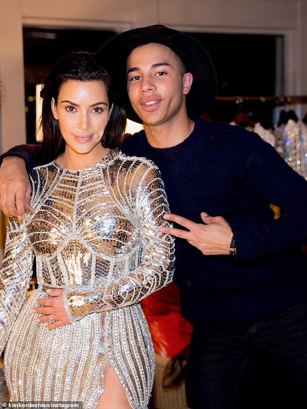 The TV personality seemed to skip out her very sheer and sexy lace gown by Roberto Cavalli in 2015 and shared a snap of her bold Balmain silver dress