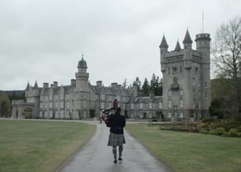 'A Very Special Delivery' opens with the King's piper walking through Balmoral Castle grounds