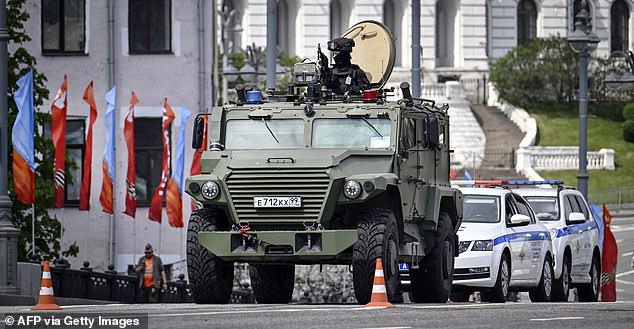 A Russian Federal Guard Service (FSO) armoured vehicle patrols central Moscow on May 5, 2026, few days ahead of the Victory Day military parade