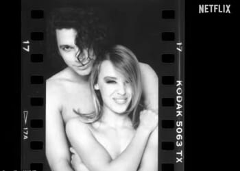 Kylie Minogue gave a first glimpse into her life as she dropped the Netflix trailer for her upcoming 'intimate' documentary KYLIE on Instagram on Tuesday; pictured with ex Michael Hutchence