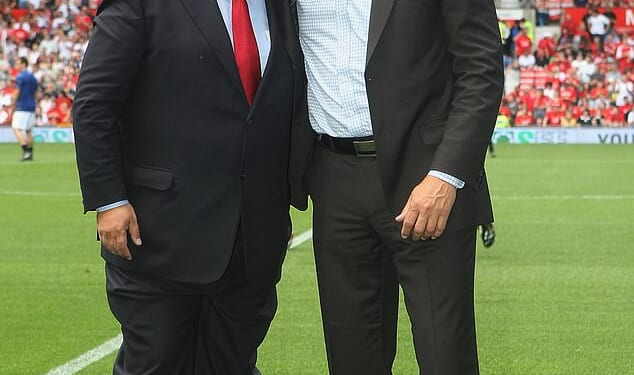Eamonn Holmes poses with former footballer Peter Schmeichel ahead of the Ole Gunnar Solskjaer Testimonial match between Manchester United and RCD Espanyol at Old Trafford in 2008
