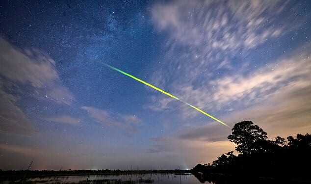 The Eta Aqauriid meteor shower will reach its dazzling peak in the next few days, bringing up to 40 shooting stars per hour. Pictured: A rare green fireball during the Eta Aquariid meteor shower seen in Florida, USA
