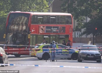Officers maintained a large cordon on the south London street on Saturday, following the shooting in the early hours of the morning
