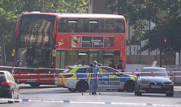 Officers maintained a large cordon on the south London street on Saturday, following the shooting in the early hours of the morning