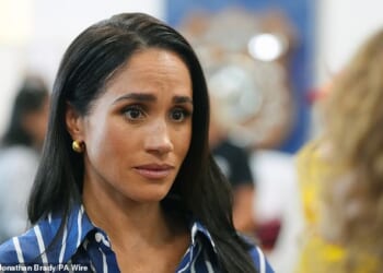 The Duchess of Sussex, pictured in Australia last month, flew to Chicago to support her godson at his first communion
