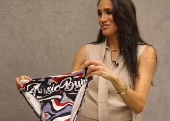 Meghan Markle received eight quintessentially Australian gifts - including a pair of 'Aussie Bum' swimming briefs - from YouTubers Sean Skeels and Marley Whatarau when they met in Sydney last month