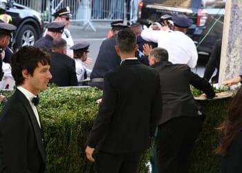 A Met Gala intruder was tackled by police and security as he attempted to rush the steps as A-listers Kim Kardashian and Beyonce hit the red carpet at the MOMA in New York on Monday
