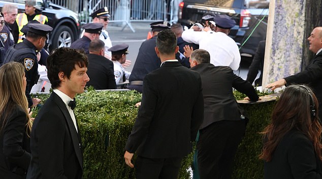 A Met Gala intruder was tackled by police and security as he attempted to rush the steps as A-listers Kim Kardashian and Beyonce hit the red carpet at the MOMA in New York on Monday