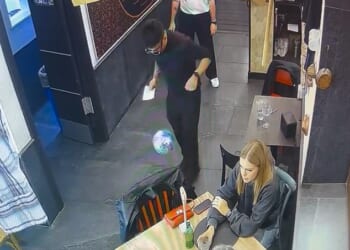 An Italian waiter was left red-faced after his attempt to show off his football skills at a restaurant in Naples backfired