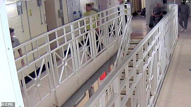 Disgraced former rock star Ian Watkins (far left) emerges bleeding from his cell after having his neck fatally slashed, in CCTV from Wakefield prison shown to the trial of his alleged killers