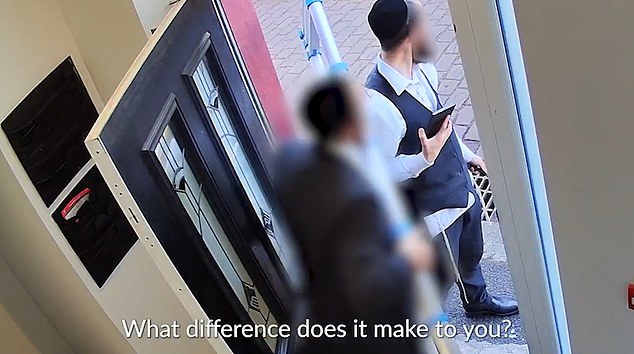 The two men, who were wearing kippahs, were entering a property in Bury last Wednesday when they were stopped by two men asking them questions