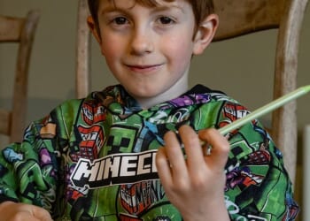 Little Rowan Antolovi (pictured), who has a rare genetic eye disorder, is struggling to manage in the classroom because of his failing eyesight