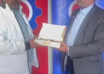 In a video posted online, Wajad Burkey and Sardar Khan (both pictured), both members of George Galloway's Workers Party of Britain, posed with a box of sweets and praised Iran after it blocked the Strait of Hormuz
