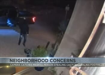 A masked man was caught on camera on April 29 driving up to a home in the Catalina Foothills in Arizona, the same neighborhood where Nancy Guthrie was abducted