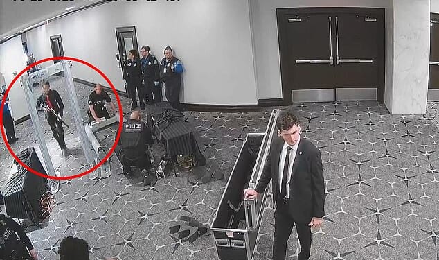 The alleged shooter carried a 12-gauge shotgun through the hotel