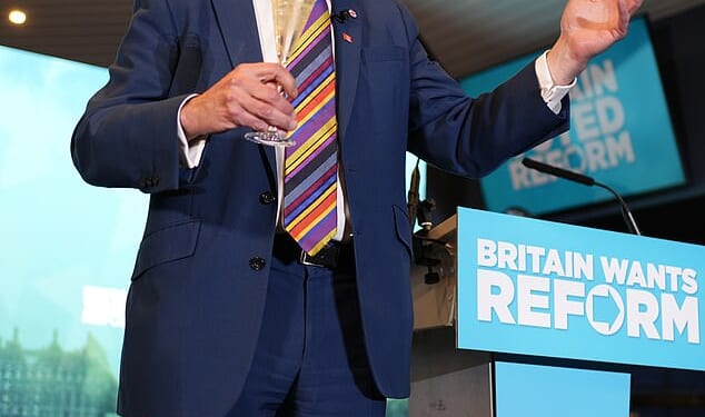 Reform leader Nigel Farage speaks to supporters at Chelmsford City Racecourse, Essex, following the 2026 local election results