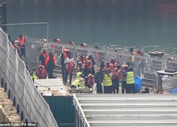 Scores of migrants who had been picked up by Border Force mid-Channel then disembarked onto the dockside at Dover