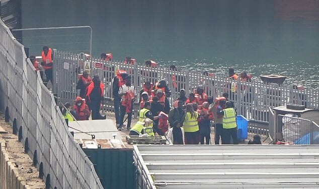 Scores of migrants who had been picked up by Border Force mid-Channel then disembarked onto the dockside at Dover