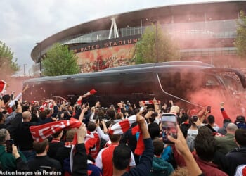 The tone for the raucous atmosphere at the Emirates before, during and after Arsenal's win over Atletico Madrid was set by a bus welcome organised by fan group REDaction Gooners