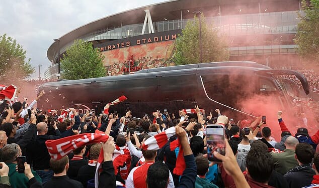 The tone for the raucous atmosphere at the Emirates before, during and after Arsenal's win over Atletico Madrid was set by a bus welcome organised by fan group REDaction Gooners