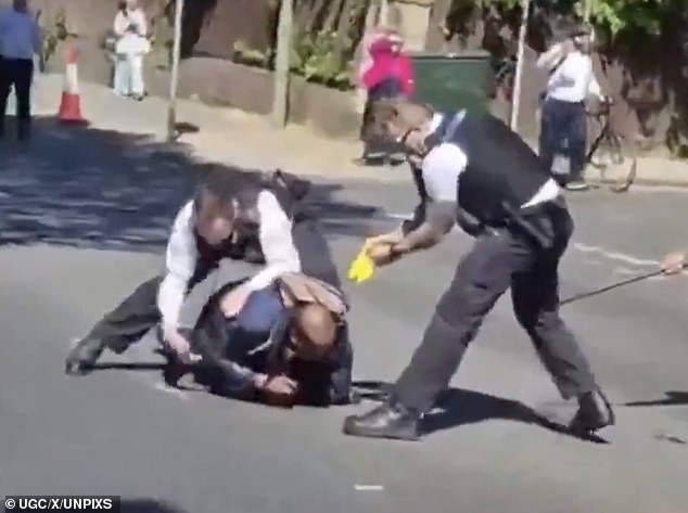 Terrorism has come once again to our doorstep. Pictured: The moment police detained a man suspected of stabbing two Jewish men in Golders Green, north London, on Wednesday