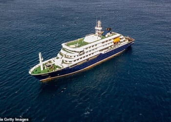 A British man was taken to intensive care after the virus spread onboard the MV Hondius (pictured), travelling from Ushuaia in Argentina to Cape Verde in Africa