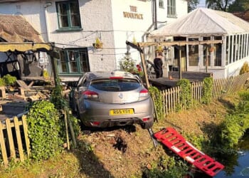 A Renault Megane became the ninth vehicle to crash into The Woolpack in Dorset after it drove through a bridge in the early hours of Monday