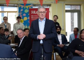 Keir Starmer in Ealing, west London, this morning... the tieless shirt did him no favours, writes Quentin Letts, his white neck bringing back echoes of that cold day in 1587 when Mary Queen of Scots stepped on to the execution scaffold