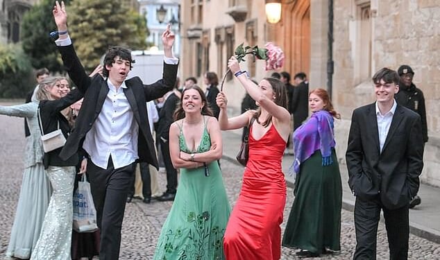 Revellers wearing flowing ball gowns and undone bow ties sauntered bleary-eyed through the cobbled streets of Oxford during the early hours of Sunday after events held at two separate colleges