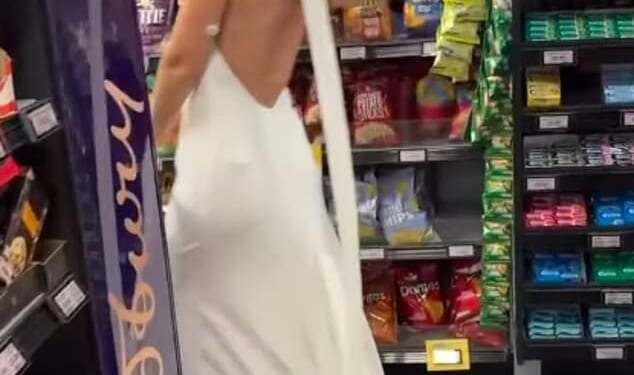Roxy Horner wore her wedding dress down the supermarket aisle and declared: 'I refuse to wear this once' as she shared a new Instagram post on Sunday