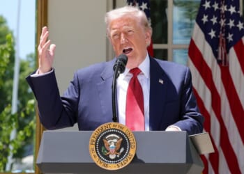 President Donald Trump delivers remarks Friday in the Rose Garden of the White House.