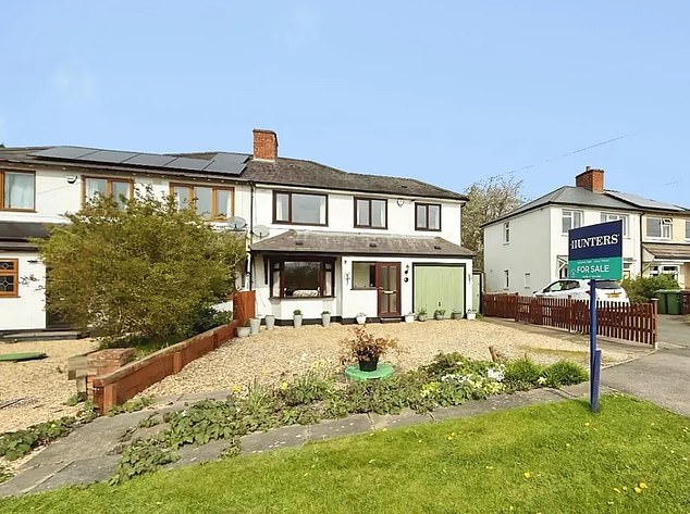 This four-bed property on Kineton Lane has a generous garden, two bathrooms and plenty of space for entertaining