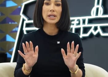Emily Abraham, one half of Love Luxury, a high fashion reseller with stores in London and Dubai and a massive social media following