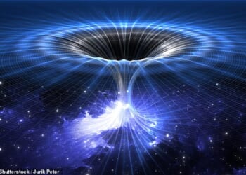 Scientists say that dark matter may have formed a wormhole in the centre of the Milky Way, connecting our galaxy to a distant part of the universe (artist's impression)