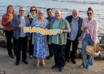 Some of the syndicate who won the lottery. From left to right, Sally Wise, Ian Howells, Christine Davies, Gillian Furlong, Raja Prasad, Paul Davey, Allan Evans and Julie Lambert
