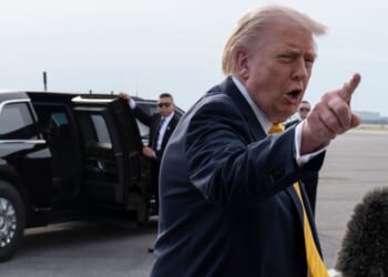 President Donald Trump speaks to journalists at Palm Beach International Airport on May 2, 2026 in Palm Beach, Florida.