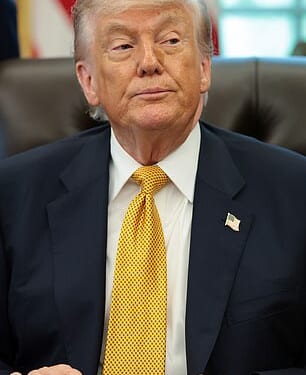Donald Trump looks on during an event in the Oval Office of the White House on May 6