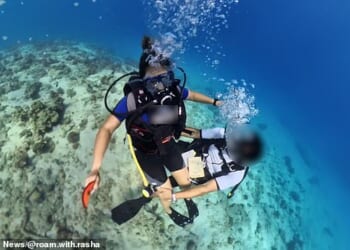 A holidaymaker has shamed a 'creepy' scuba diving instructor after filming him repeatedly 'touching her inappropriately' while underwater