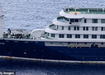 SAINT HELENA ISLAND - APRIL 24: A view of the Dutch-flagged vessel MV Hondius is seen navigating the Atlantic Ocean near Saint Helena Island on April 24, 2026. World Health Organization (WHO) Director-General Tedros Adhanom Ghebreyesus reported that seven cases of hantavirus, three of which were fatal, were detected on the MV Hondius, which was traveling from Argentina in the South Atlantic to Cabo Verde off the west coast of Africa. (Photo by Emin Yogurtcuoglu/Anadolu via Getty Images)