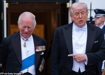 President Donald Trump and  King Charles III share a joke before a State Dinner in the East Room of the White House