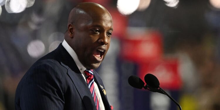 GOP Rep. Wesley Hunt of Texas speaks on stage at the Republican National Convention July 15, 2024, in Milwaukee, Wisconsin.
