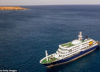 MV Hondius seen off the port of Praia in Cape Verde in 2025, where it is now stranded