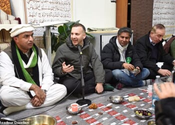 Green Party leader Zack Polanski visiting a mosque during the Manchester by-election campaign